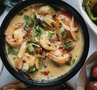 Zaap Thai Lao Restaurant signature dishes Khao Piak Sen (Lao Chicken Noodle Soup), Tom Yum, Dancing Garlic Riblets.